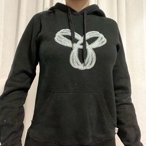 Vintage TNA aritzia black hoodie with blue logo